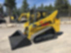 Wacker Neuson ST31 compact track loader with front bucket attachment parked at an equipment yard, available for rent from Black Box Heavy Equipment in Bay Shore, Long Island."