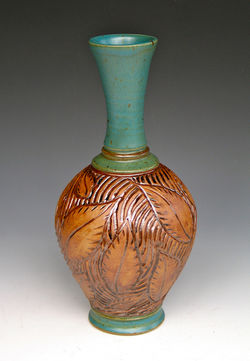 carved teal vase