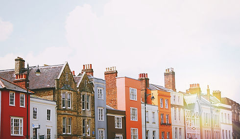 assorted-color%20concrete%20houses%20under%20white%20clouds%20during%20daytime_edited_edit