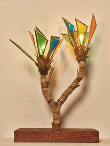 Life cycle, four sculptures of hand cut and resin covered bamboo. Stained glass lampshades with reclaimed dark wood bases.