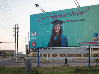 Nederlandse klantenservice onder de Surinaamse zon: uitbuiting of wederzijds voordeel