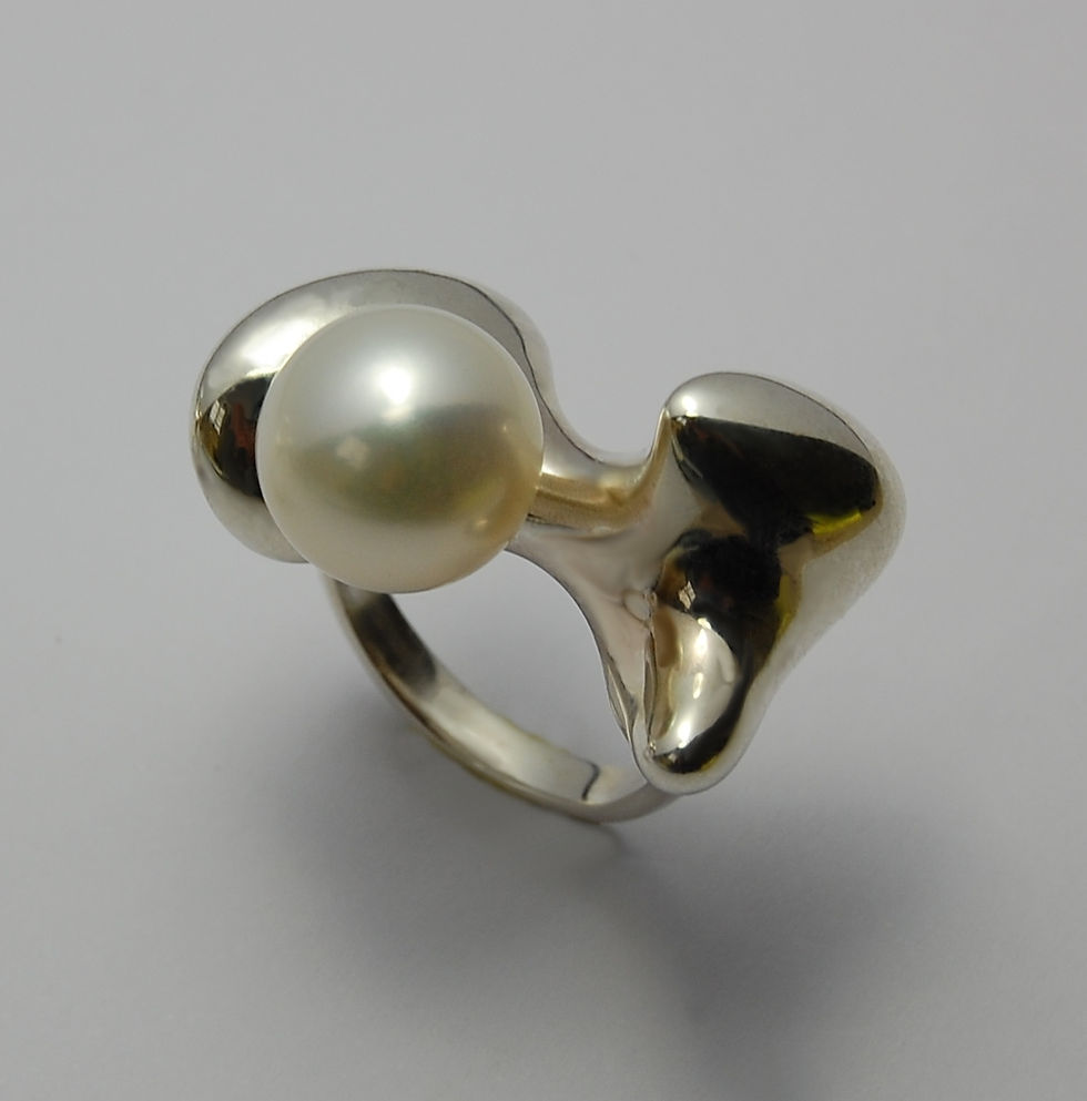 bague "osselet" en argent et perle