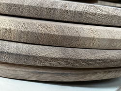 Round iroko tops.