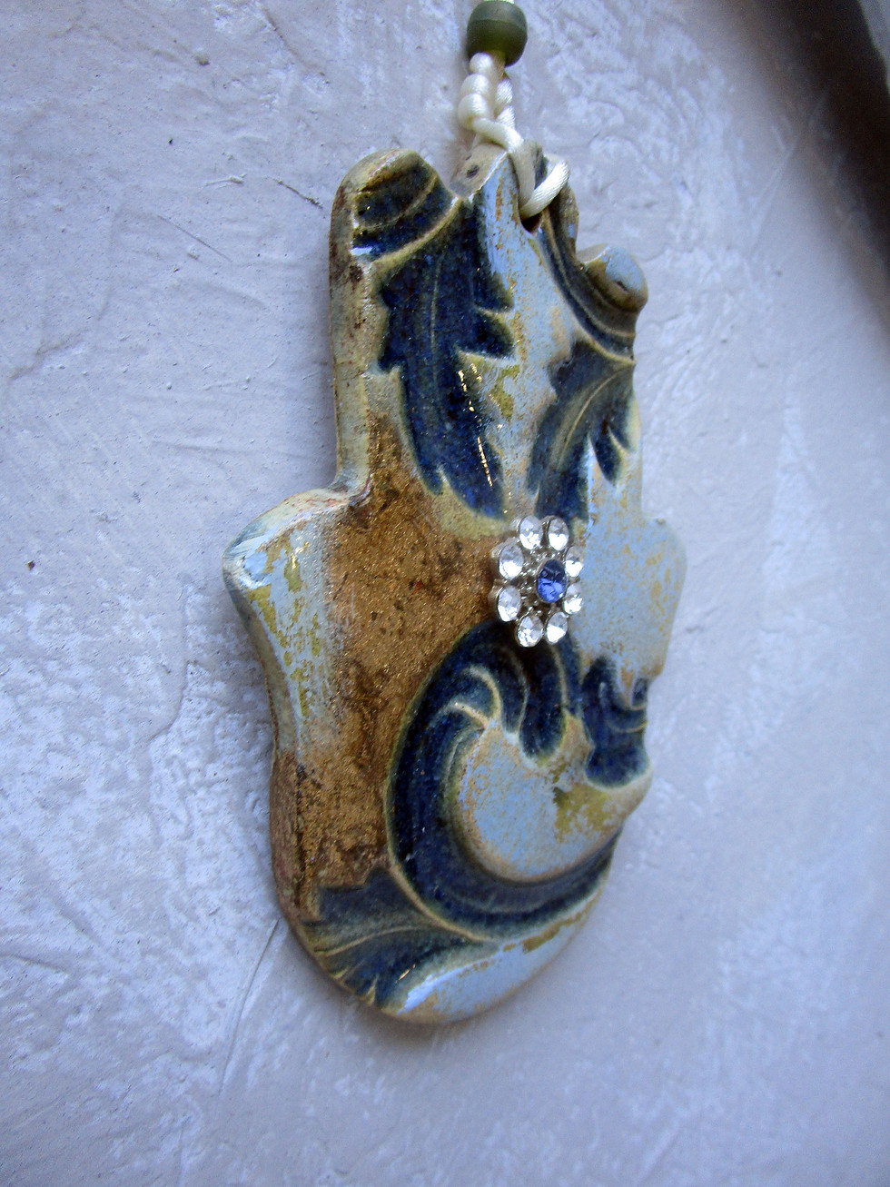 Thumbnail: ceramic royal hamsa wall hanging.