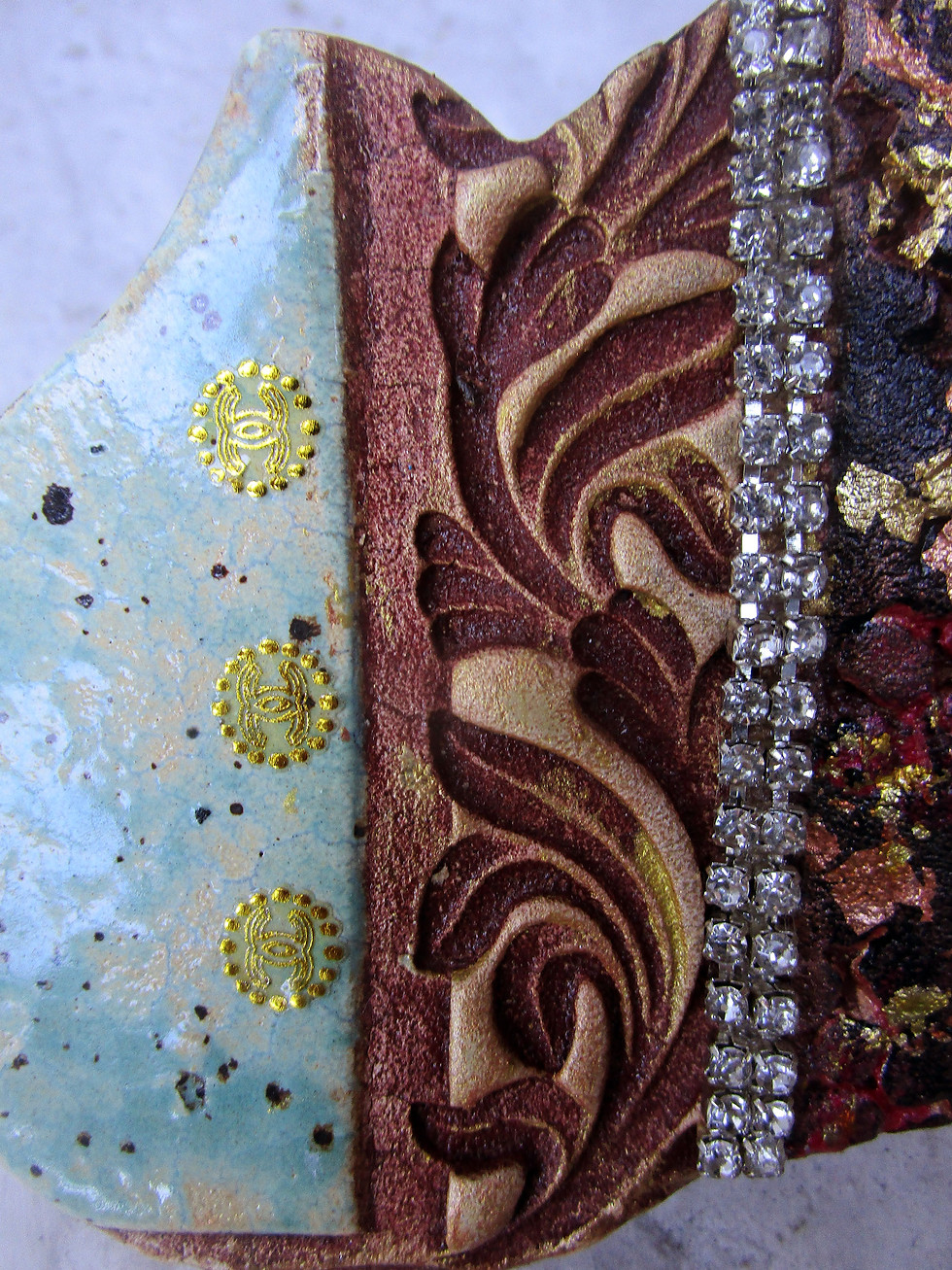 Thumbnail: ceramic textured hamsa with crystal chain.