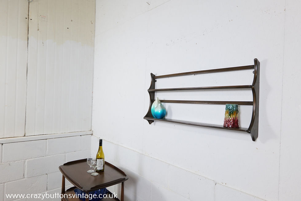 Thumbnail: Ercol dark elm plate display rack