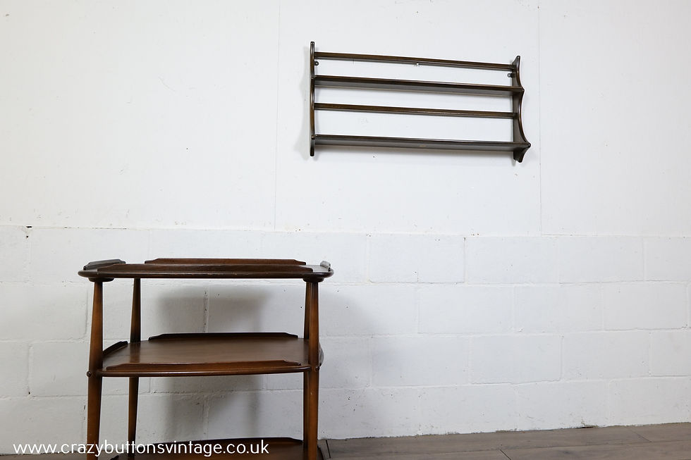 Thumbnail: Ercol dark elm plate display rack