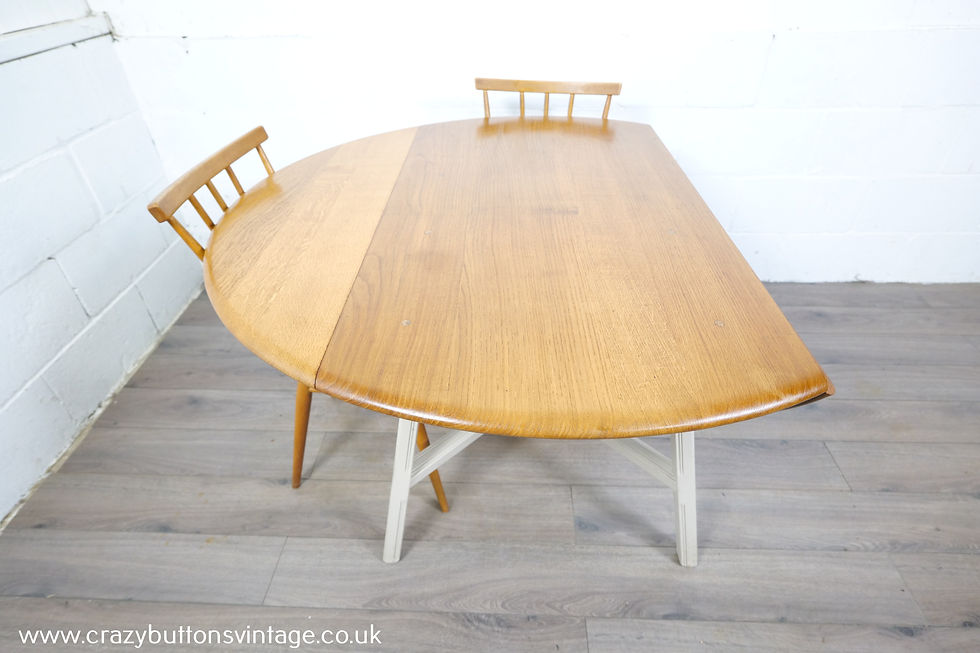 Thumbnail: Ercol drop leaf dining table 391 chairs