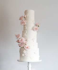 A timeless, stunning 5-tier wedding cake design featuring handcrafted sugar roses, hand-piped royal icing details, including blossoms and roses, and textured tiers.
Luxury Wedding Cakes Manchester, Luxury Wedding Cakes Cheshire, Luxury Wedding Cakes Manchester, Luxury Wedding Cakes Lancashire, Luxury Wedding Cakes Merseyside, Luxury Wedding Cakes North West, Luxury Wedding Cakes England, Luxury Wedding Cakes UK.