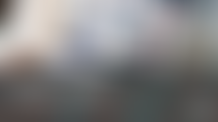 A laptop with images of webinar attendees on the screen. Text: Webinars in 2026. Are they still worth it for B2B growth?