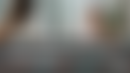 Two people talking in an office