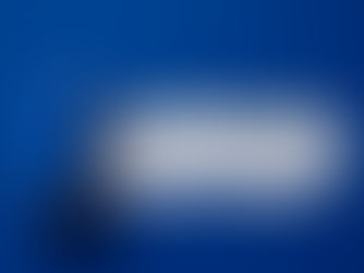 Blue torn-paper graphic reveals a white strip reading Keep Showing Up.