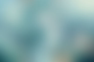 Surreal image of a peaceful face with a brain and pills in a dreamlike setting. Surrounded by flora, sun, and moon against a teal background.