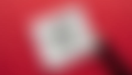 A torn note on a red surface reads "I accept myself as I am" in bold black letters.