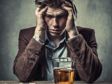 man drinking alcohol