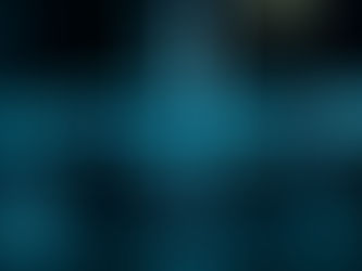 A syringe with blue liquid, needle tip down, glows against a dark background with the word "TRANQ" overlaid, a nickname for the drug Xylazine.