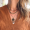 Thumbnail: triple layer coconut + moonstone necklace