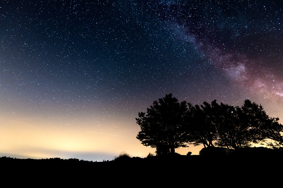 The Milky Way along the rock walls up to