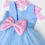 Miniatura: Vestido elegante en tonos azul y detalles rosa