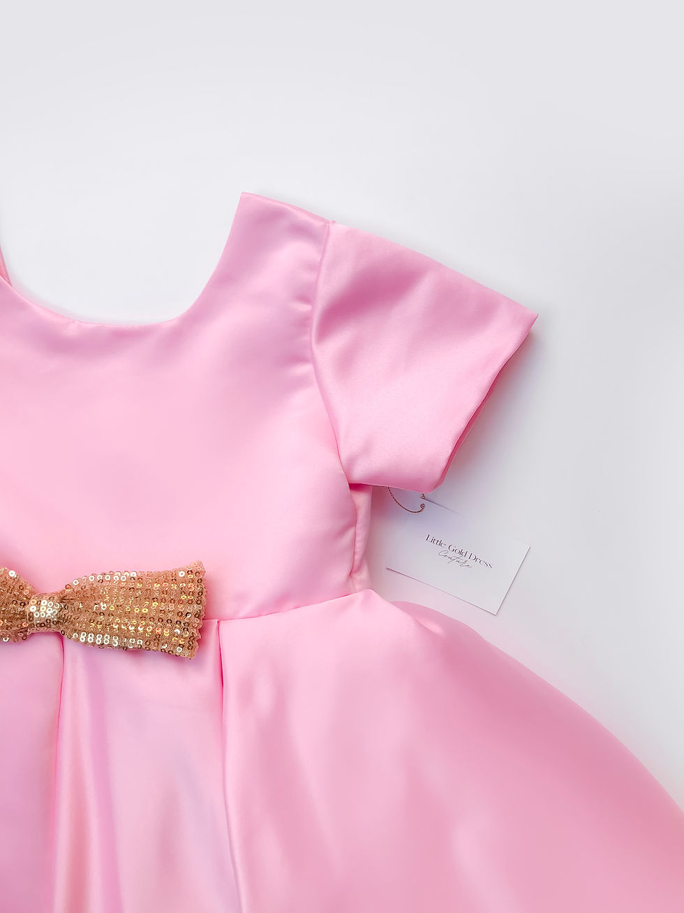 Miniatura: Vestido rosado elegante con doble lazo lentejuela