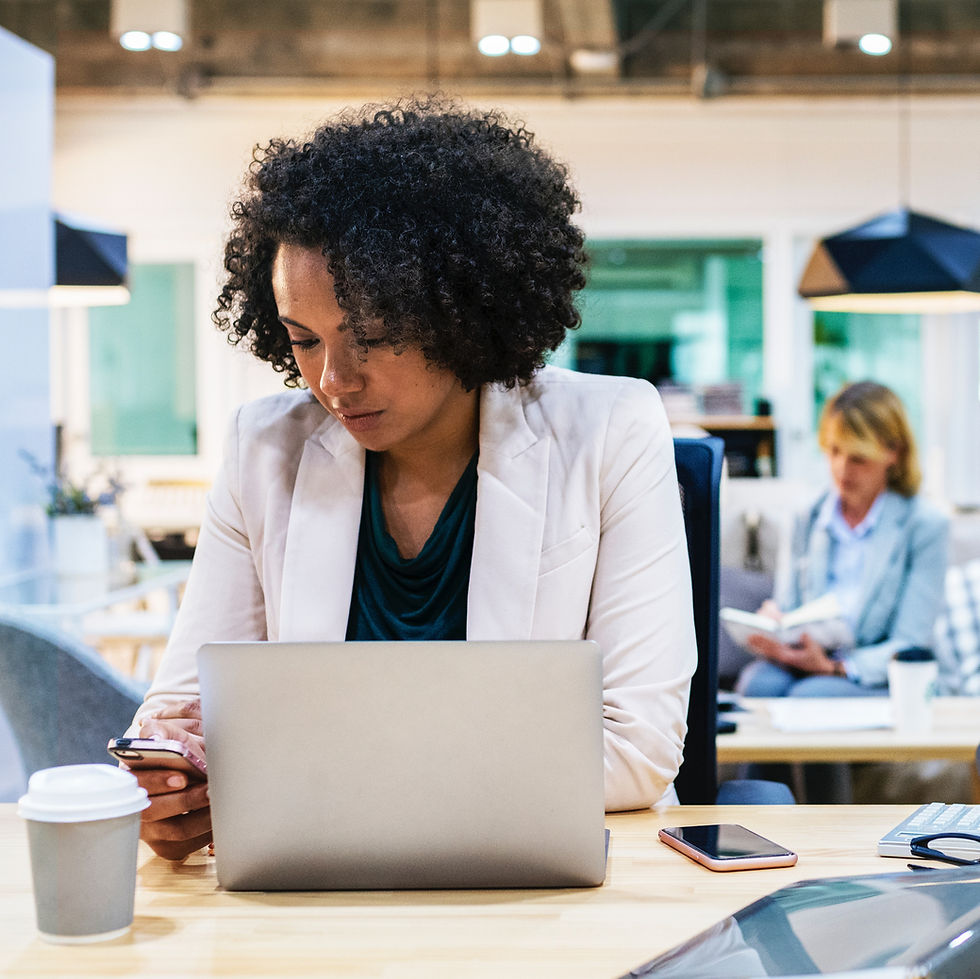 a woman working at her desk