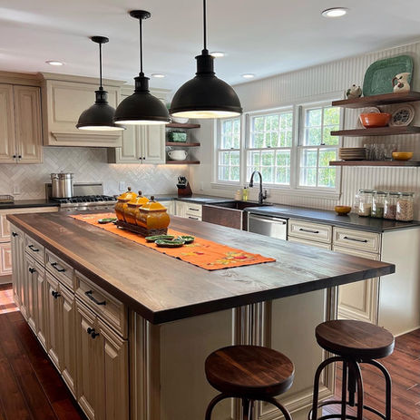 Modern kitchen with island, pendant lights, shelves, and Kitchens. Kitchen remodeling High Point.