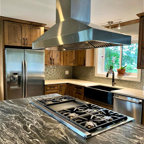 Modern kitchen with stainless steel appliances and a granite countertop Kitchens Boyle Home Improvement