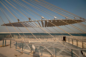 Lusail pedestrian bridge in Doha designed by Philip Shikhess, award-winning architectural design and urban infrastructure project ,  canopy over the glass floor