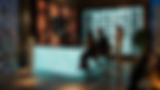 RILIEVO AI Wine & Material Experience Lounge featuring backlit translucent architectural surfaces, custom shelving systems, illuminated wine displays, and luxury hospitality design.