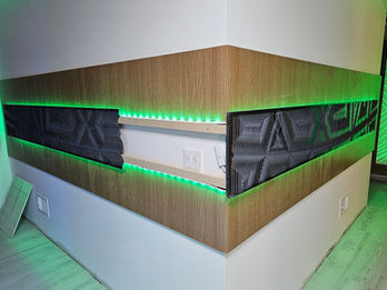 RILIEVO custom CNC architectural surfaces featuring illuminated relief walls, sculptural panels, hospitality interiors, and commercial design installations