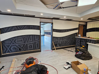 RILIEVO custom CNC architectural surfaces featuring illuminated relief walls, sculptural panels, hospitality interiors, and commercial design installations