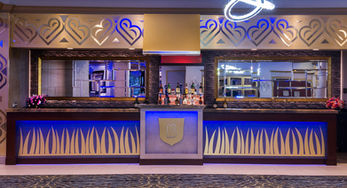 Decorative CNC relief panels integrated into a luxury banquet hall bar designed by RILIEVO.