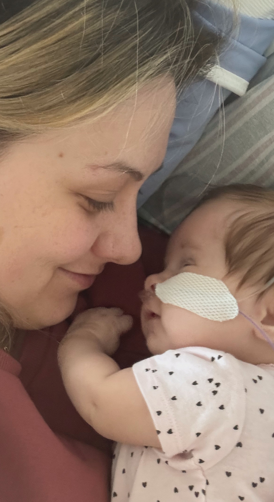 Mother gazing at her baby with love