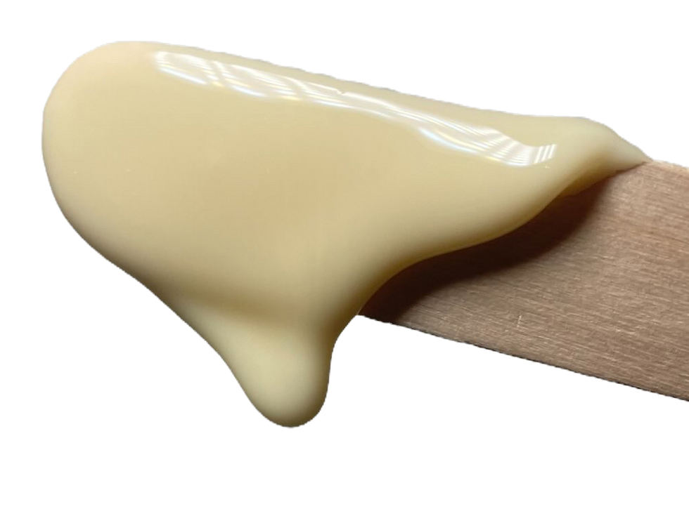 Close-up of waxing spatula with warm wax – used in accredited waxing training by Becky’s Beauty, Essex