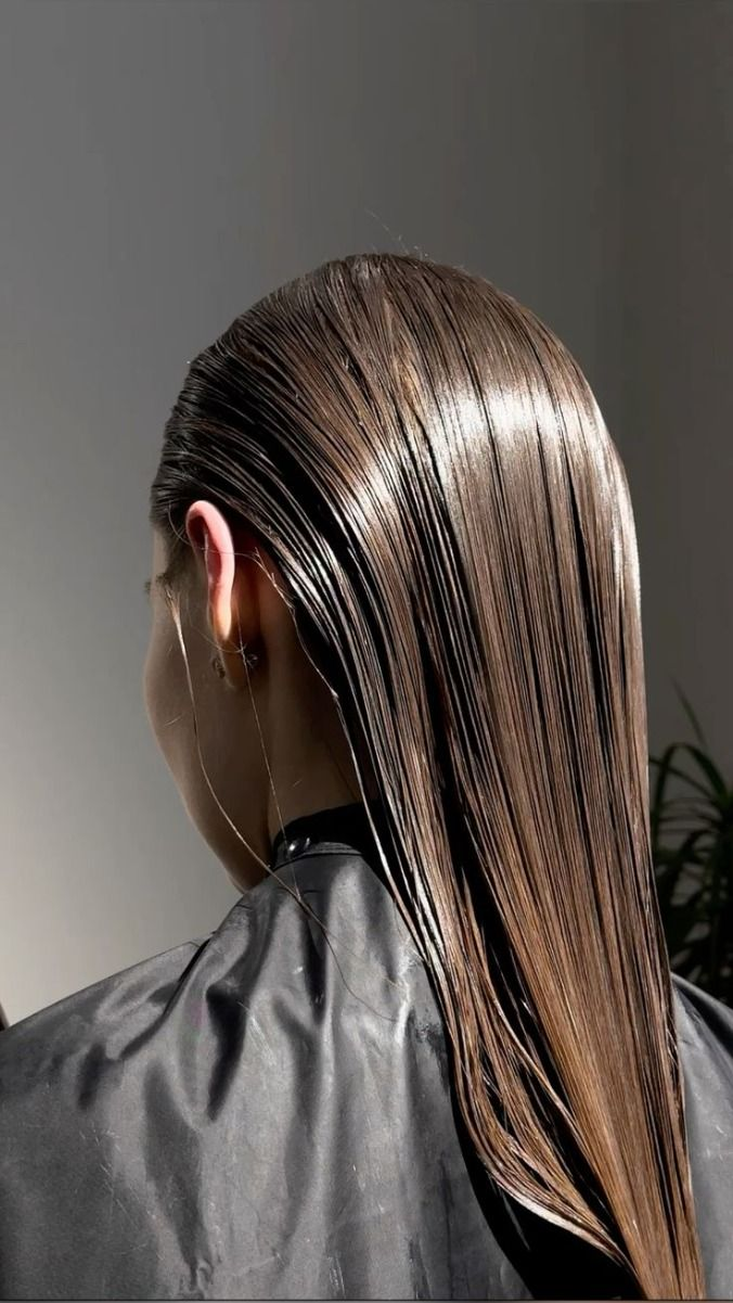 Eye-level view of a modern hair salon styling station with tools