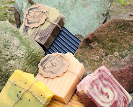 A colorful pile of bars of handmade soap