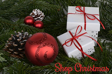 Christmas ornament and gifts on pine tree branches