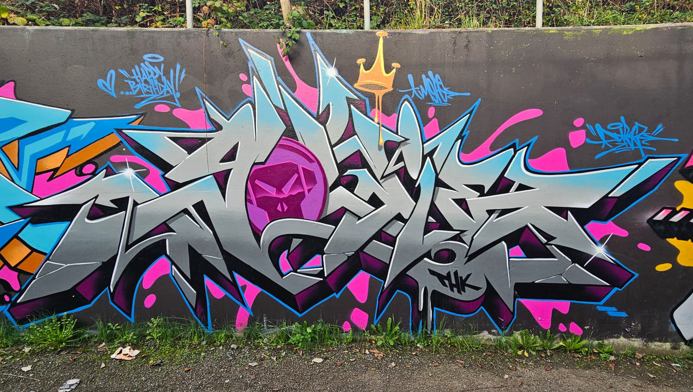 Wild looking graffiti letters that say Goldie featuring the Metalheadz logo