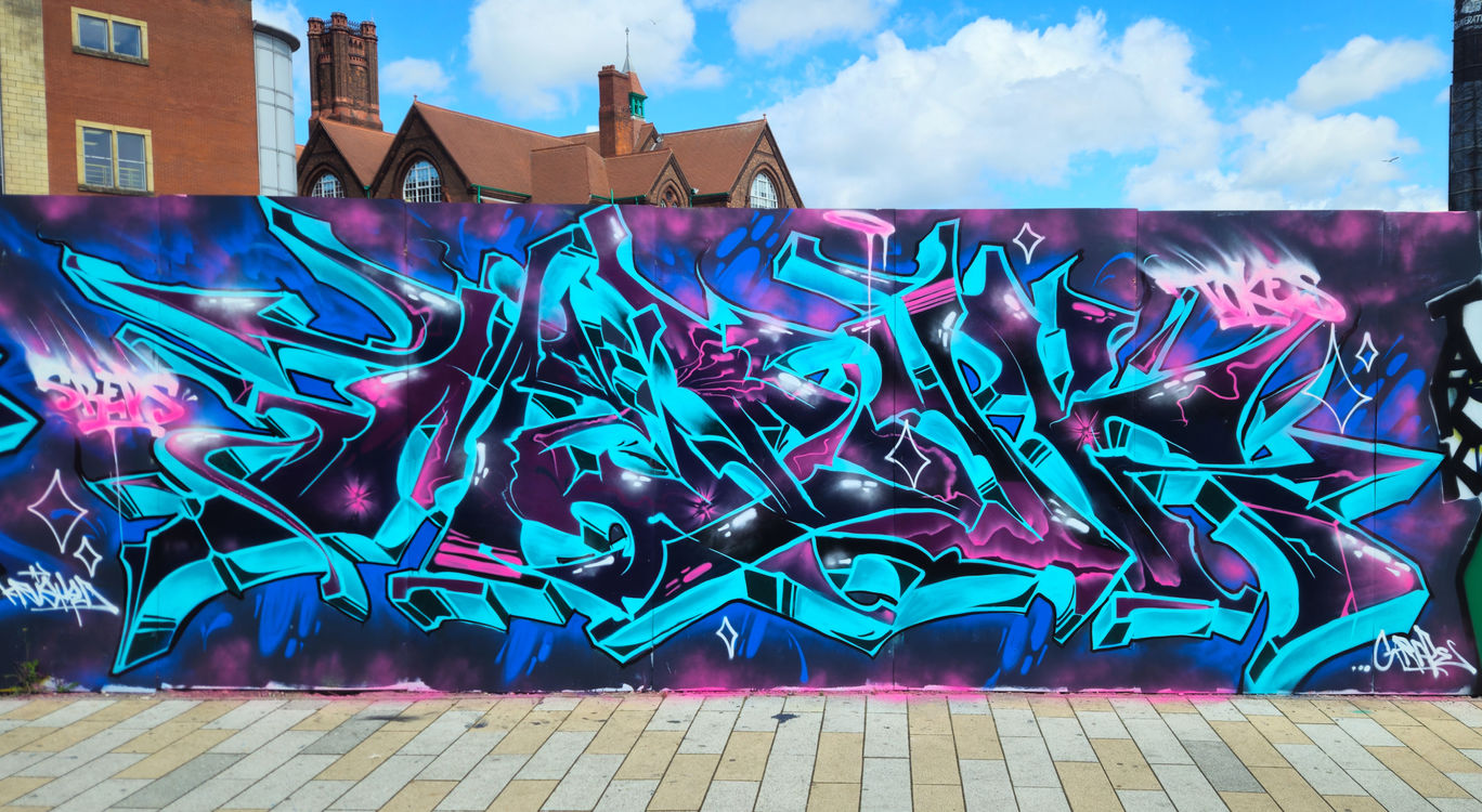 Some amazing graffiti letters that use the colours turquoise, blue and black painted writer artist Medik Medyck KG