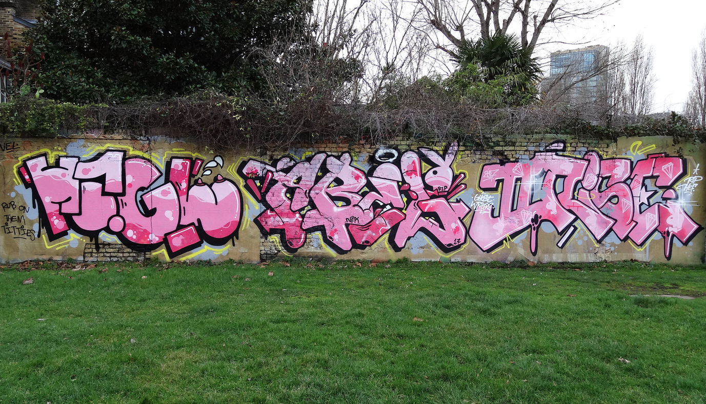 3 individual, pink coloured, pieces of graffiti (featuring a Playboy bunny) painted in Shoreditch, London