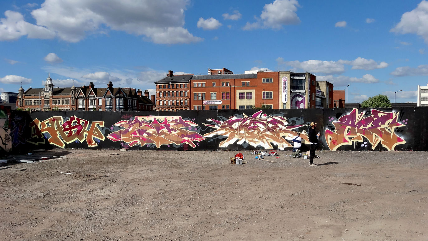 Four pieces of graffiti that are all painted in the same colours as one another painted by writer artist Kid Kash, Orghone, Awone and Ace Uno