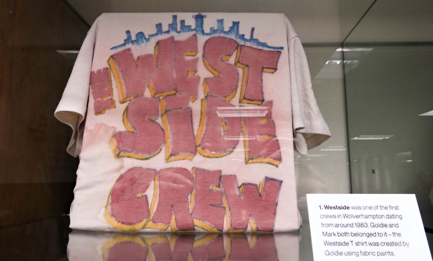 An old T-Shirt airbrushed with graffiti art by writer artist DJ Goldie TWC