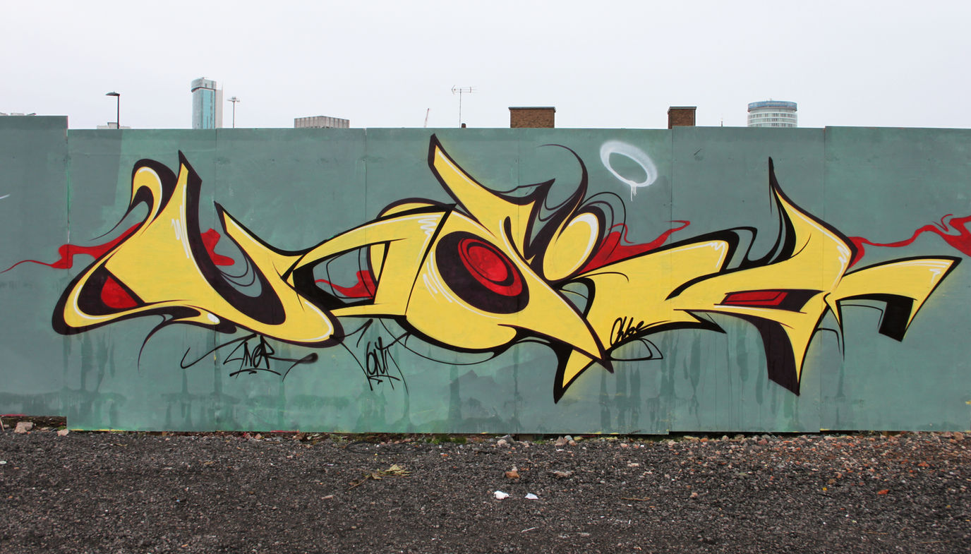 Yellow and red graffiti lettering that says "Vodka" painted by writer artist Vodka