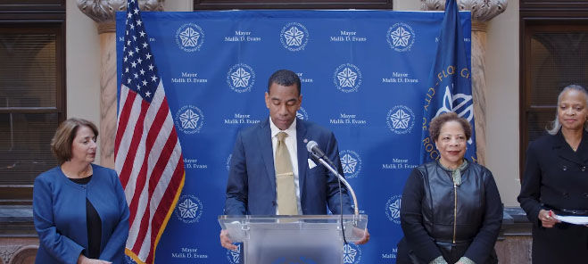 Mayor Malik Evans (at podium) give update on HQTF program