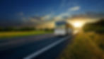 Luxurious Bus by Webster Coach Line driving on a highway in Canada.