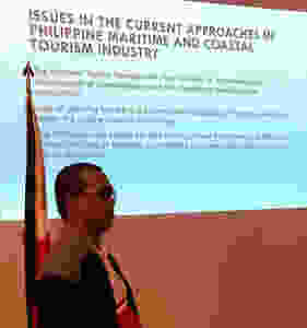 Mr. Jesse Pascasio, Director for Strategic Planning and Communications of National Coast Watch Council Secretariat discussing the National Marine Policy during the Maritime Forum held at the Admiral Hall of the Lighthouse Marina Resort