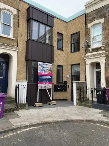 nut brown zinc cladding in west London