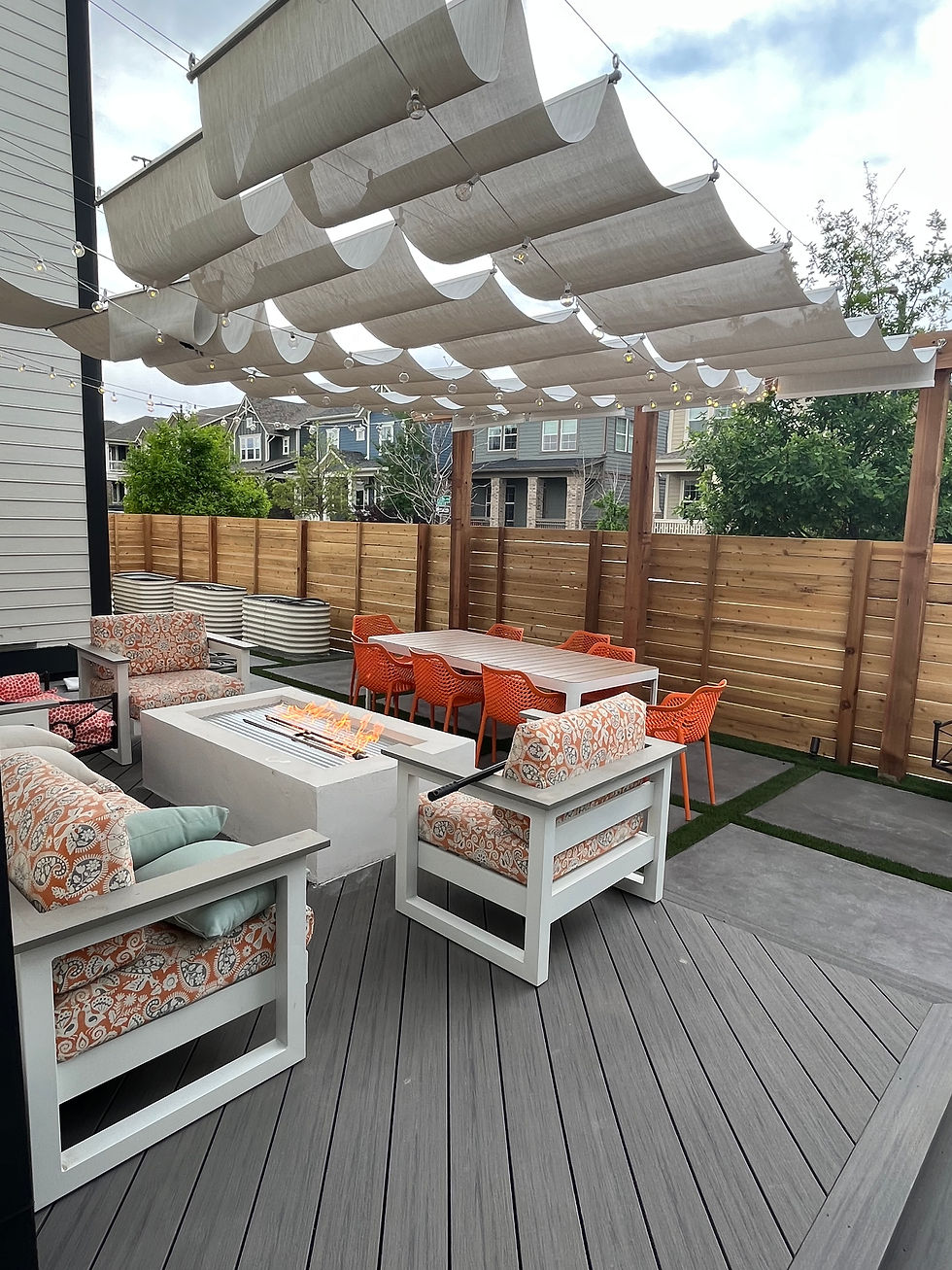 denver_landscape_decking_dining_concrete_turf border_sail shades_fire pit