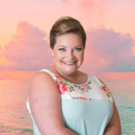 Liza Jacobus, Travel Designer, Romantics Travel team member with a pastel ocean sunset background