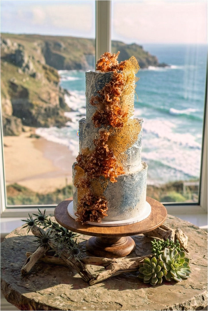 Coastal wedding cake with hand-painted coral and underwater sea design